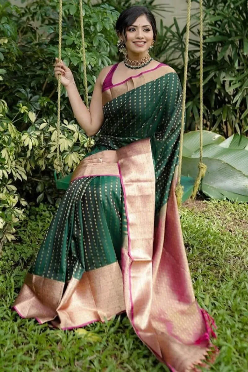 Adorning Dark Green Soft Silk Saree With Glorious Blouse Piece